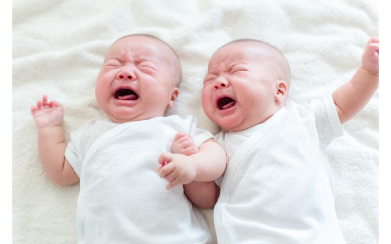 twins crying at same time