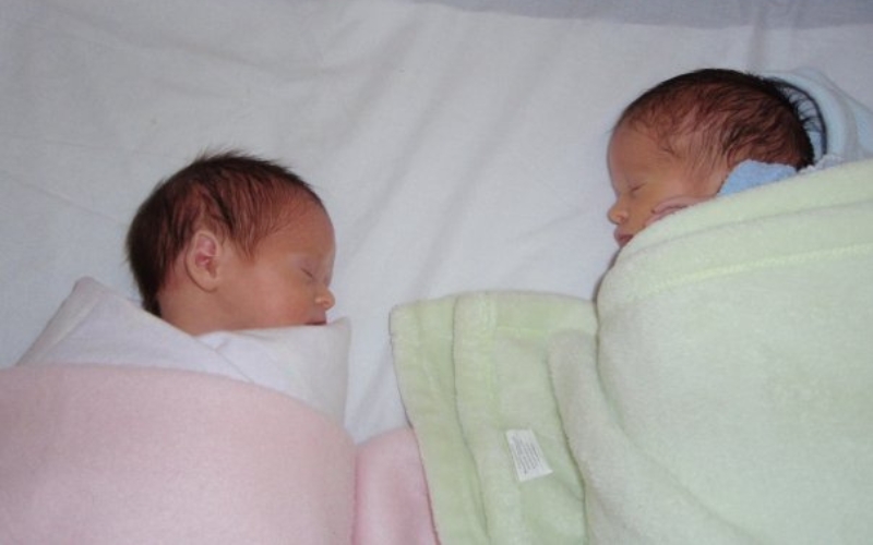 twins sharing a cot