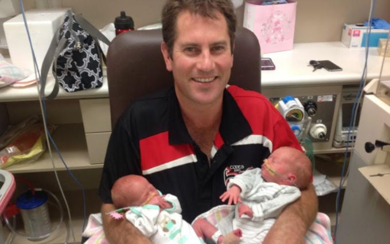 Twins dad working away